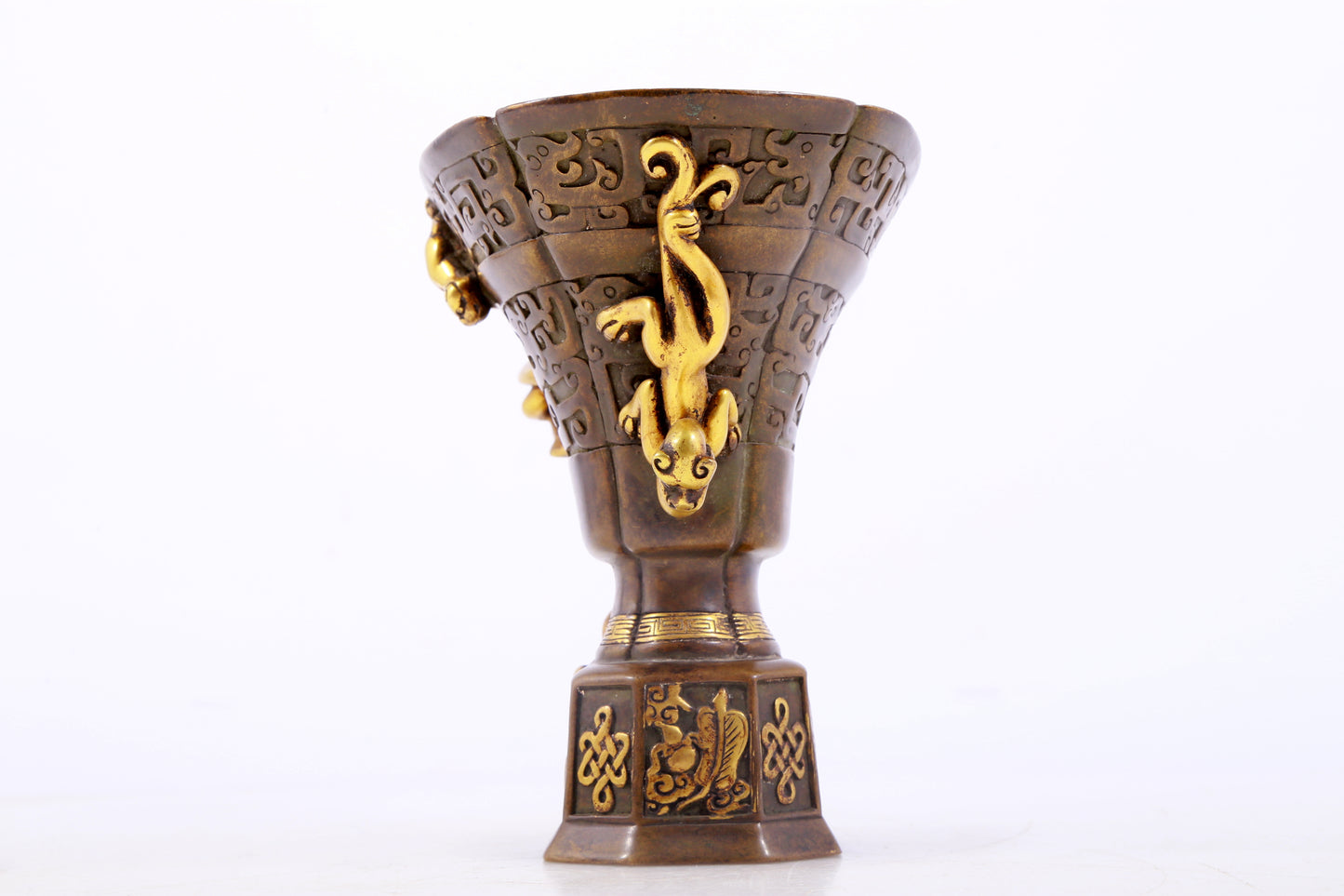 An exquisite gilt copper cup with dragon pattern