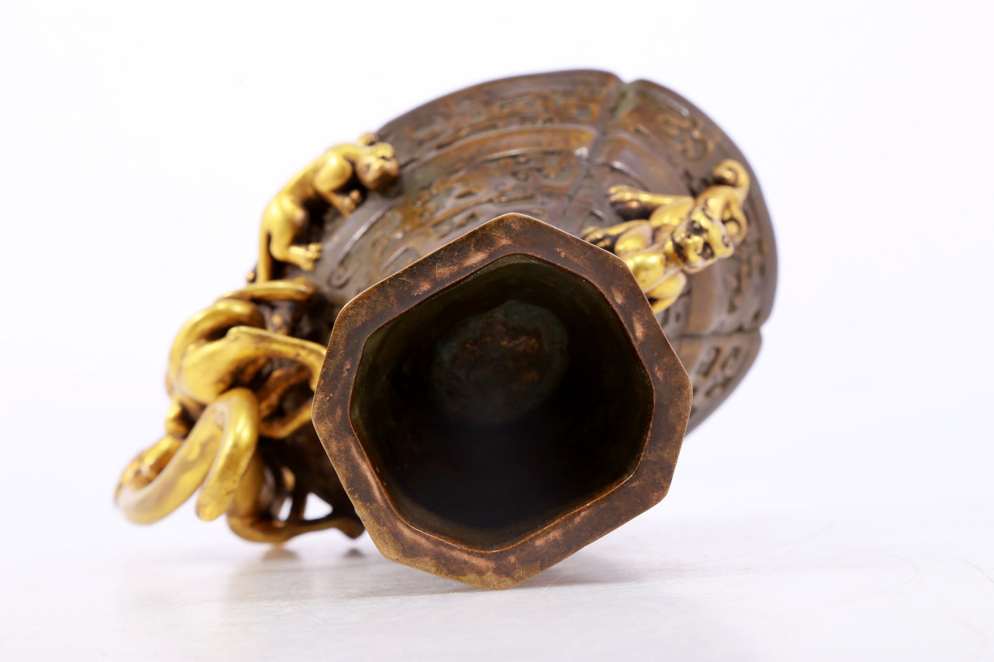 An exquisite gilt copper cup with dragon pattern