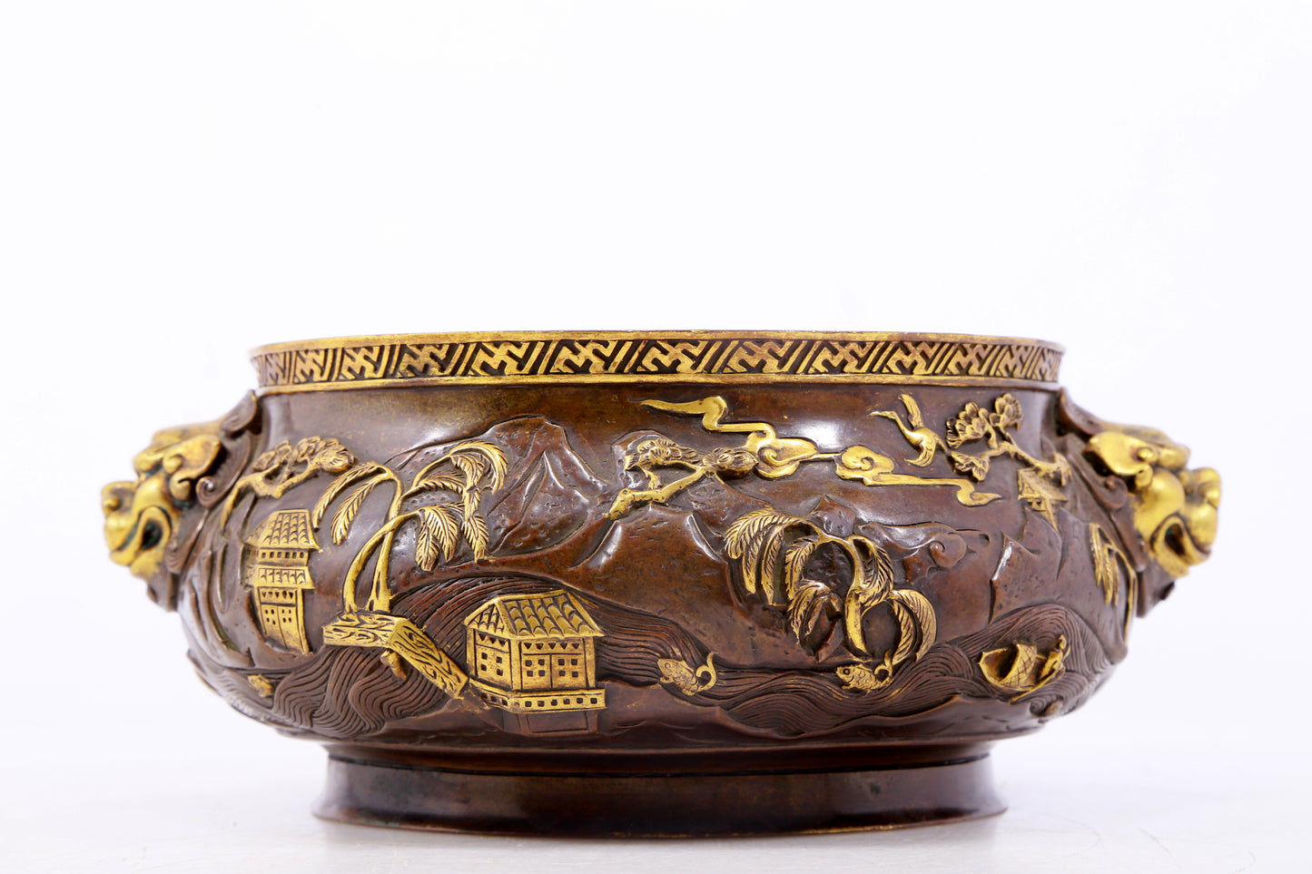 An exquisite gilt copper landscape and animal ear censer