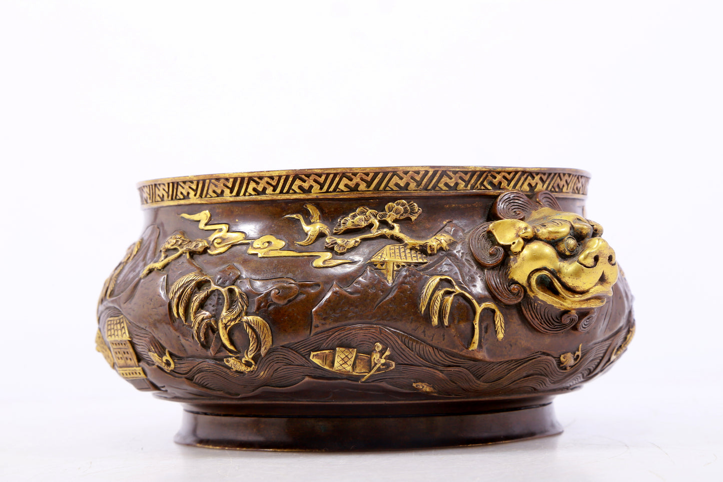 An exquisite gilt copper landscape and animal ear censer