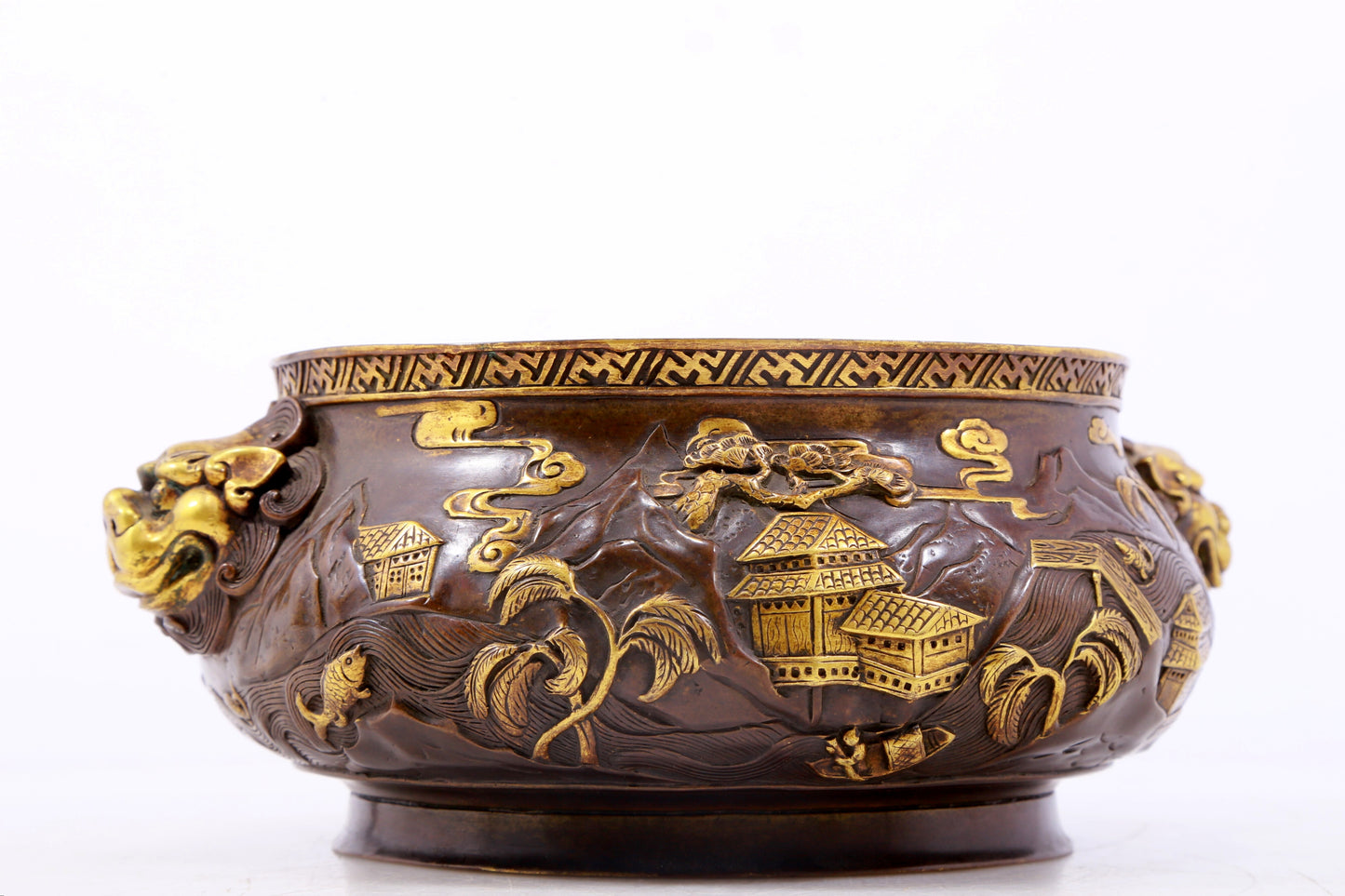 An exquisite gilt copper landscape and animal ear censer