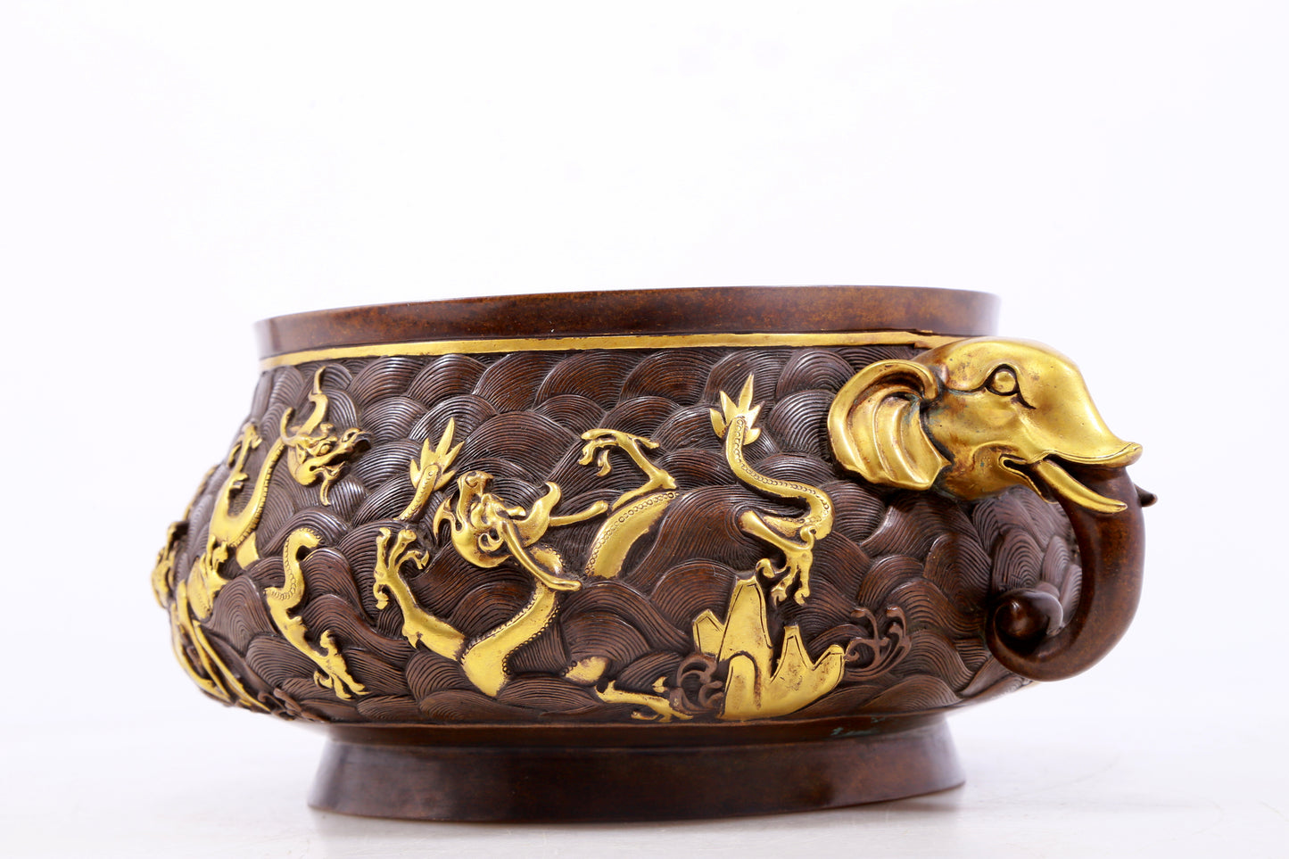 An exquisite gilt copper double-eared censer with 'sea water and dragon' patterns