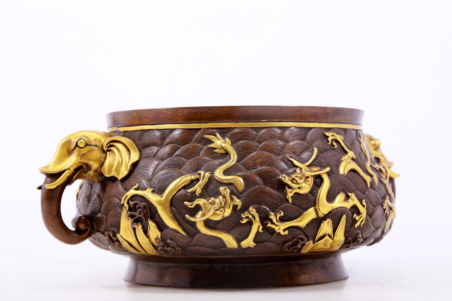 An exquisite gilt copper double-eared censer with 'sea water and dragon' patterns