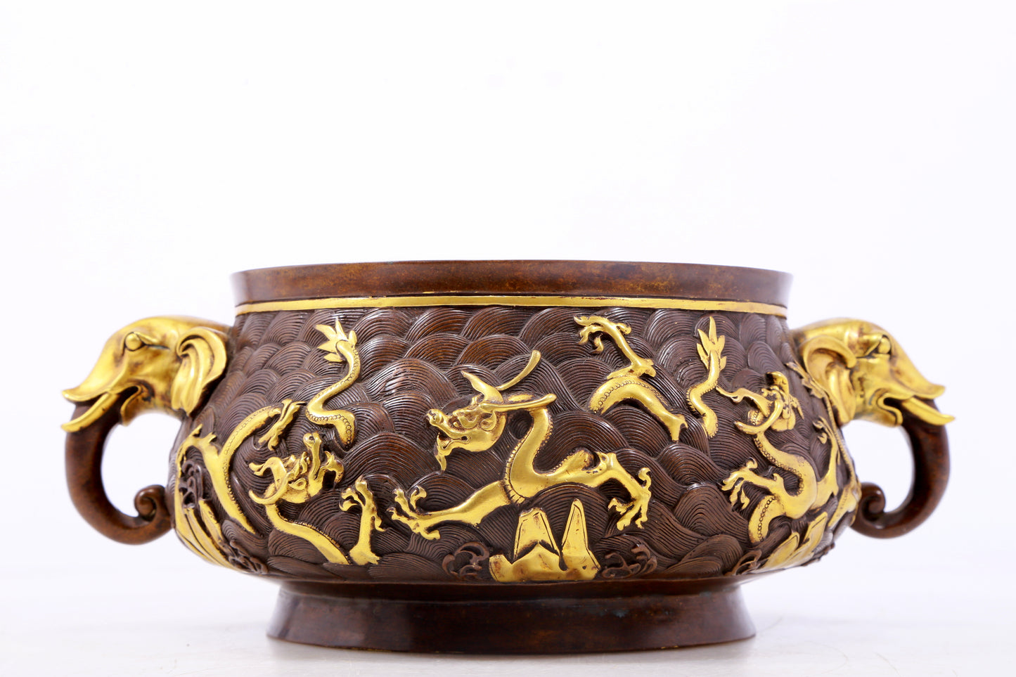 An exquisite gilt copper double-eared censer with 'sea water and dragon' patterns