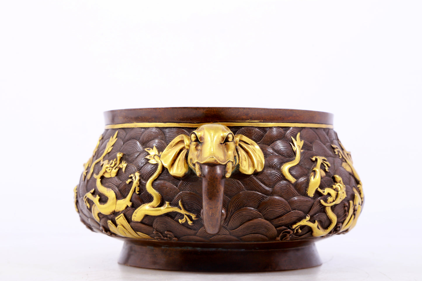 An exquisite gilt copper double-eared censer with 'sea water and dragon' patterns