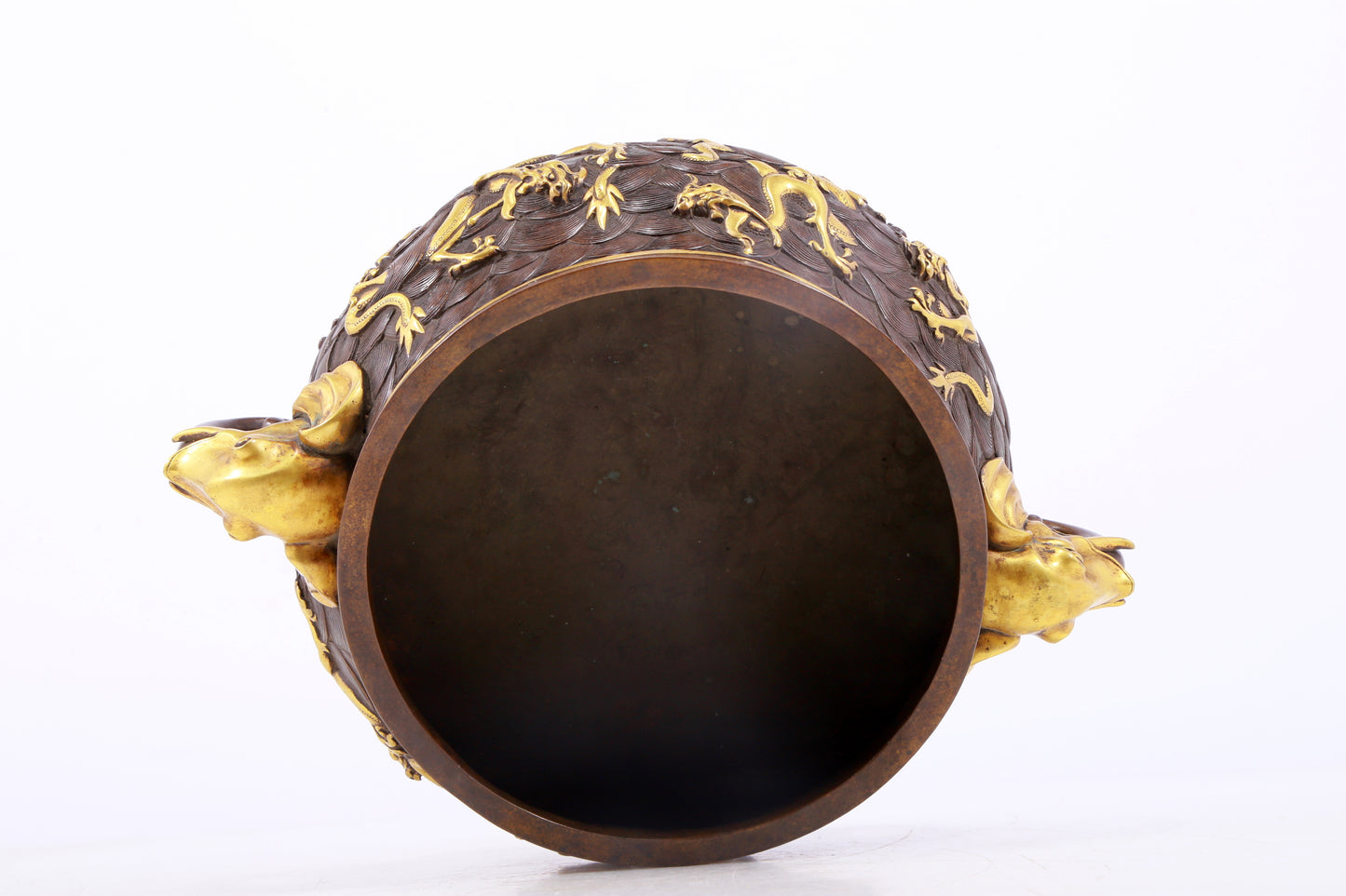 An exquisite gilt copper double-eared censer with 'sea water and dragon' patterns