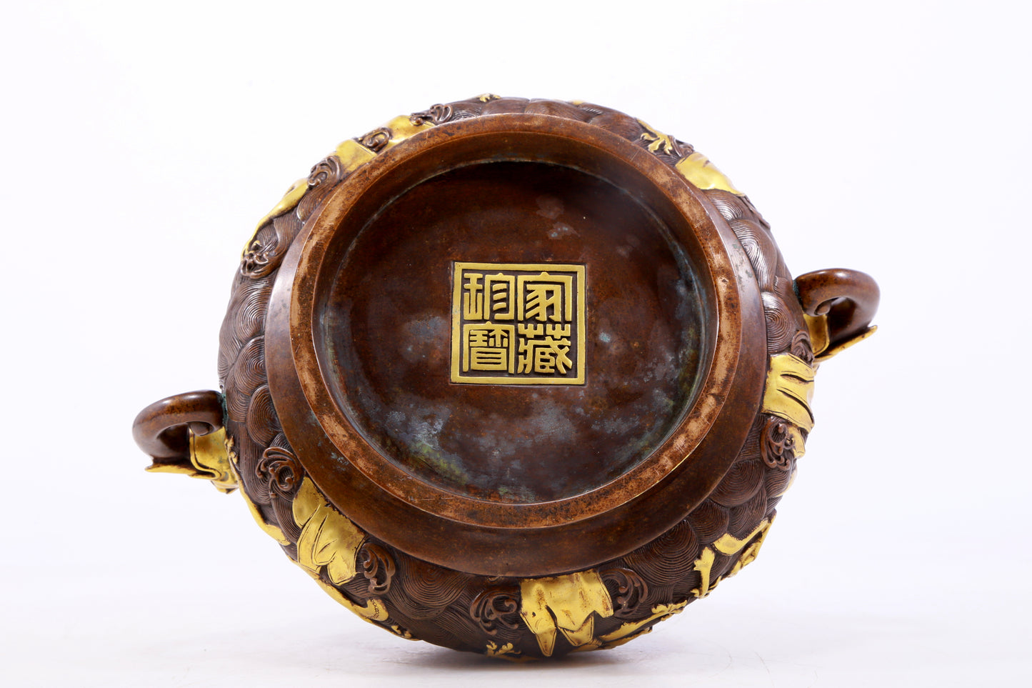 An exquisite gilt copper double-eared censer with 'sea water and dragon' patterns