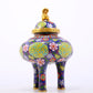 An exquisite cloisonné 'flower and dragon' tripod stove