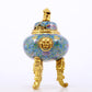 An exquisite cloisonné tangled lotus pattern two-eared tripod censer with lid