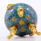 An exquisite cloisonné tangled lotus pattern two-eared tripod censer with lid