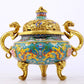 An exquisite cloisonné 'lily and dragon' pattern two-eared tripod censer with lid