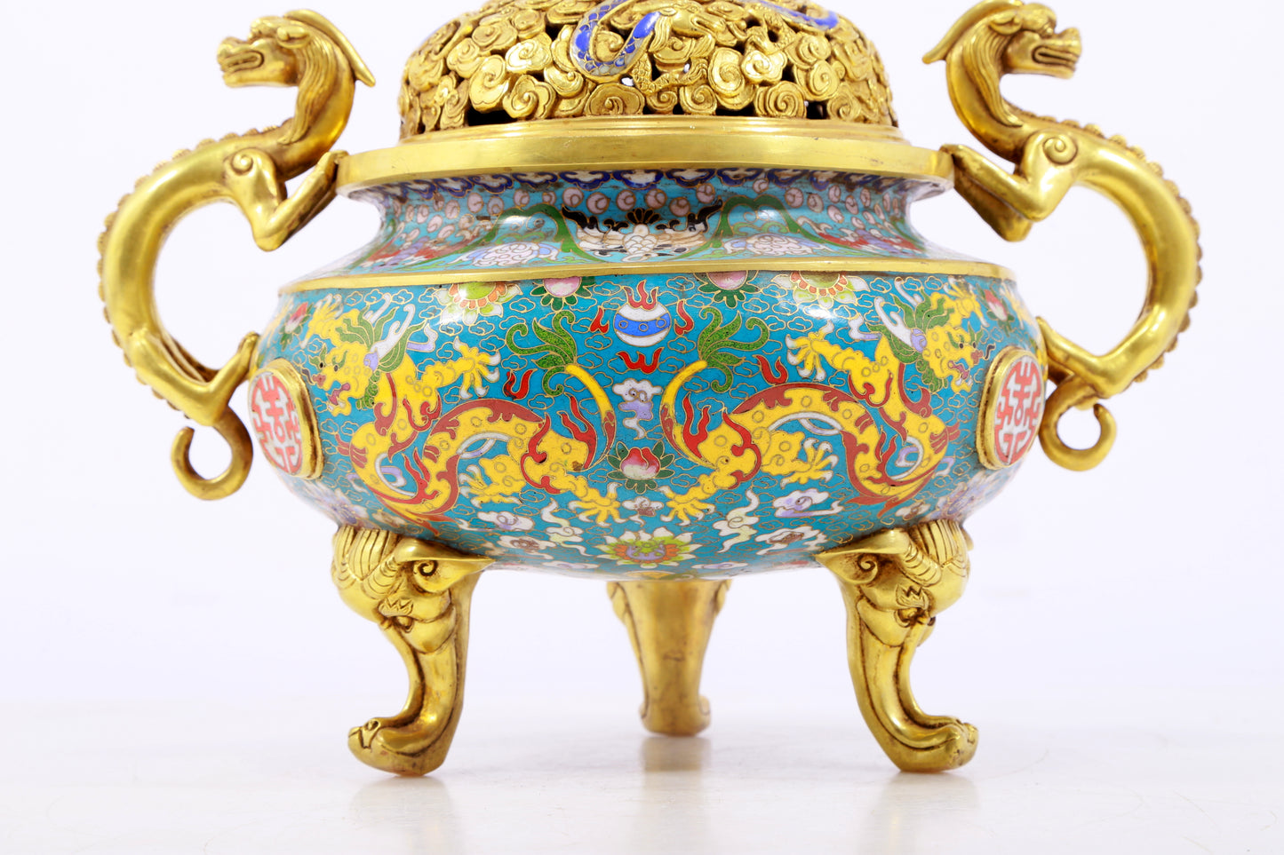 An exquisite cloisonné 'lily and dragon' pattern two-eared tripod censer with lid