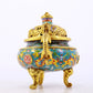 An exquisite cloisonné 'lily and dragon' pattern two-eared tripod censer with lid