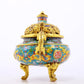 An exquisite cloisonné 'lily and dragon' pattern two-eared tripod censer with lid