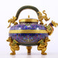 An exquisite cloisonné dragon-patterned tripod ewer