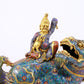 An exquisite cloisonné lion ornament