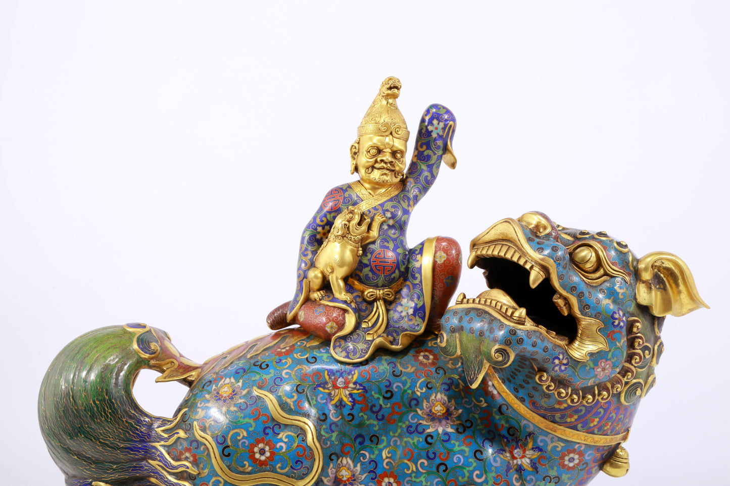 An exquisite cloisonné lion ornament