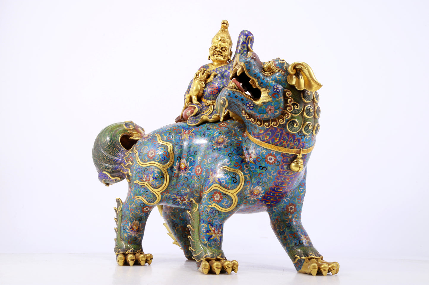 An exquisite cloisonné lion ornament