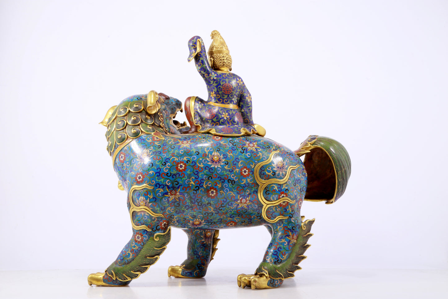 An exquisite cloisonné lion ornament