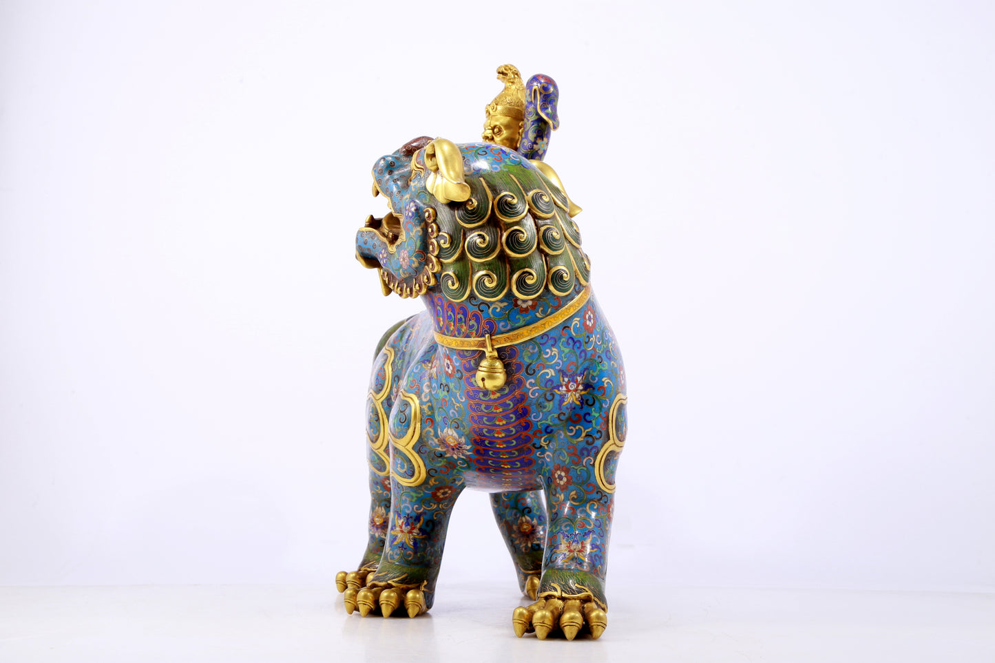 An exquisite cloisonné lion ornament