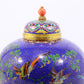 A perfect cloisonné 'flower and bird' pattern jar with lid