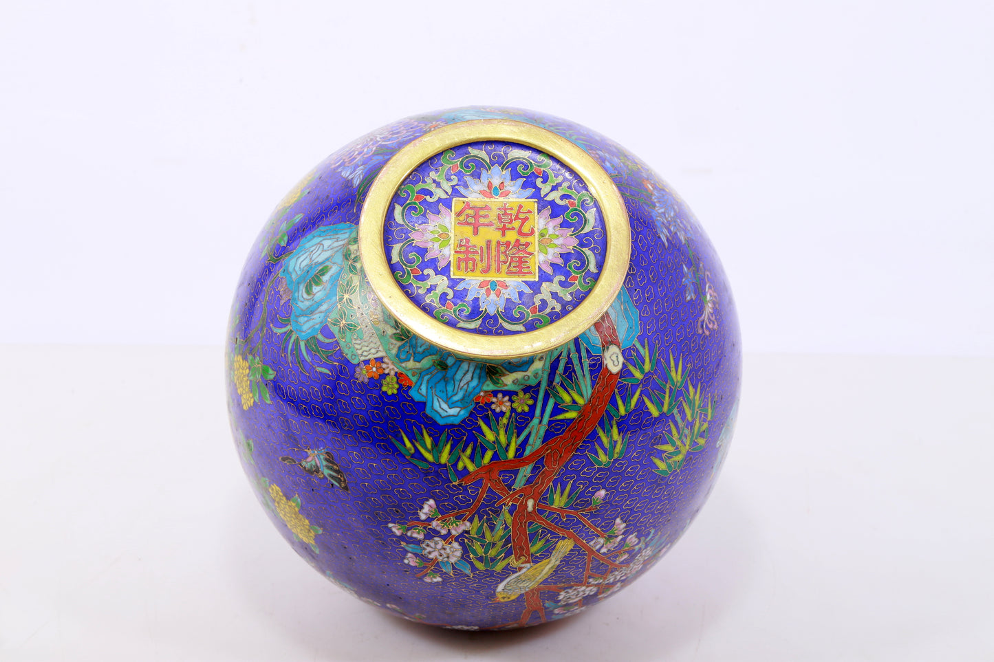 A perfect cloisonné 'flower and bird' pattern jar with lid