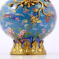 An exquisite cloisonné vase with flower and bird patterns