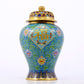 An exquisite cloisonne vase with lotus pattern and lid