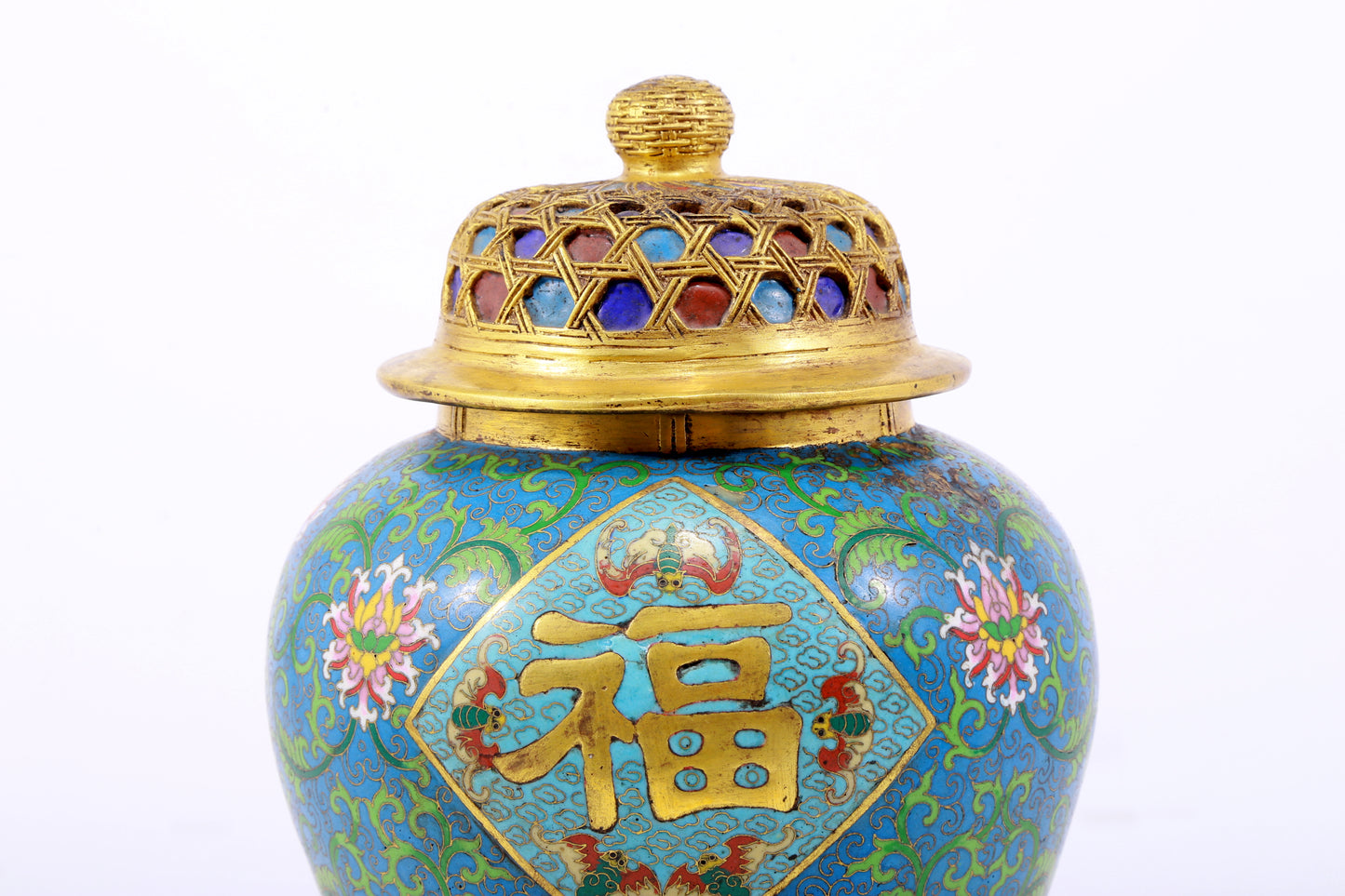 An exquisite cloisonne vase with lotus pattern and lid