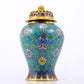 An exquisite cloisonne vase with lotus pattern and lid