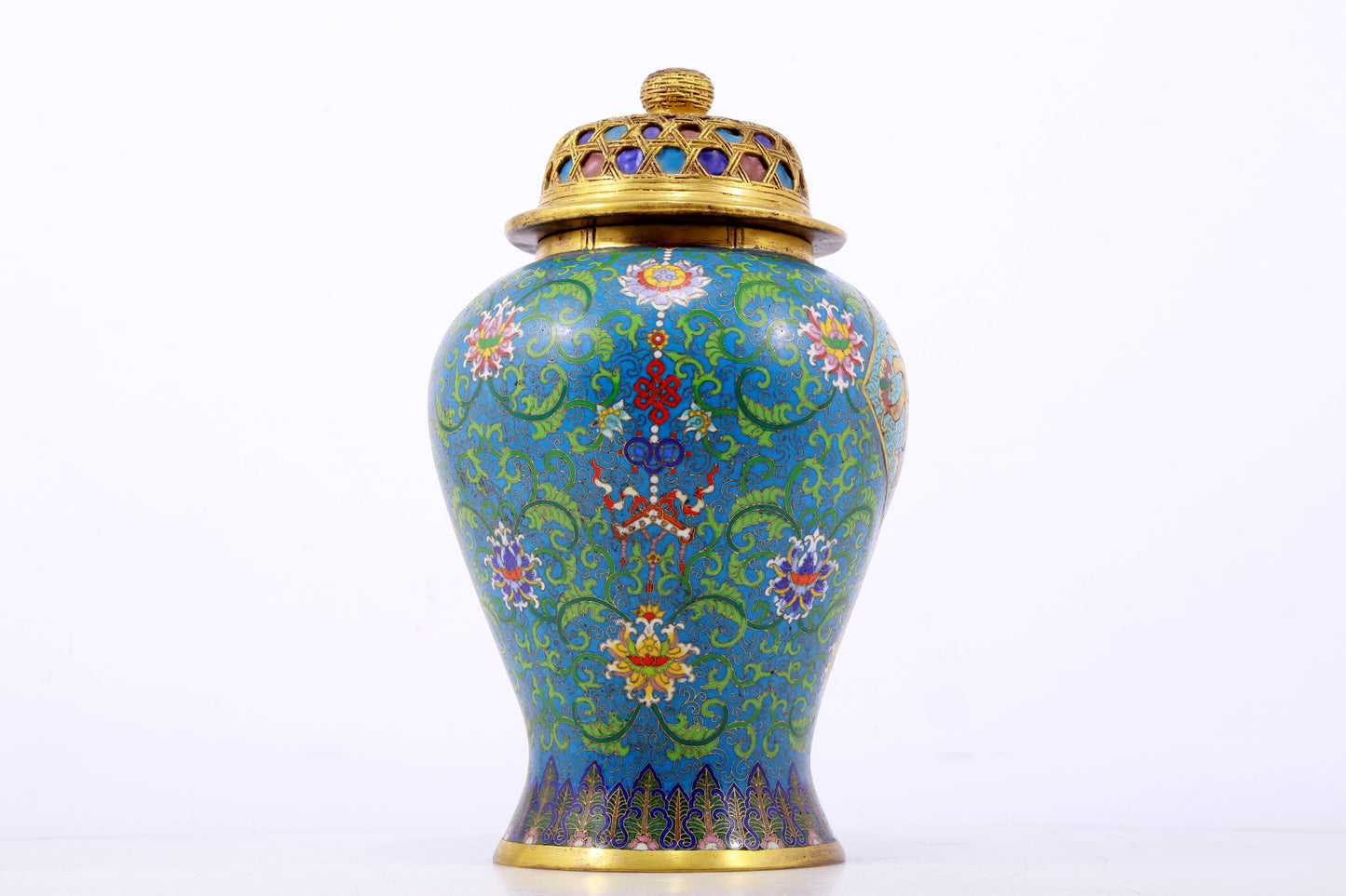 An exquisite cloisonne vase with lotus pattern and lid