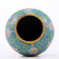 An exquisite cloisonne vase with lotus pattern and lid