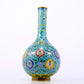 An exquisite cloisonné vase with lotus pattern