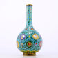 An exquisite cloisonné vase with lotus pattern