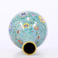 An exquisite cloisonné vase with lotus pattern