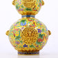 An exquisite cloisonné dragon-patterned gourd-shaped bottle with lid