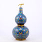 An exquisite cloisonné gourd-shaped vase with lotus pattern