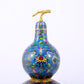 An exquisite cloisonné gourd-shaped vase with lotus pattern