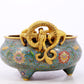 An exquisite cloisonné tripod censer with lotus pattern and dragon ears