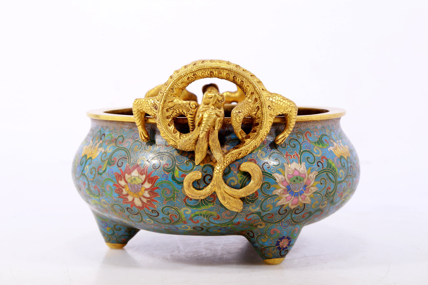 An exquisite cloisonné tripod censer with lotus pattern and dragon ears