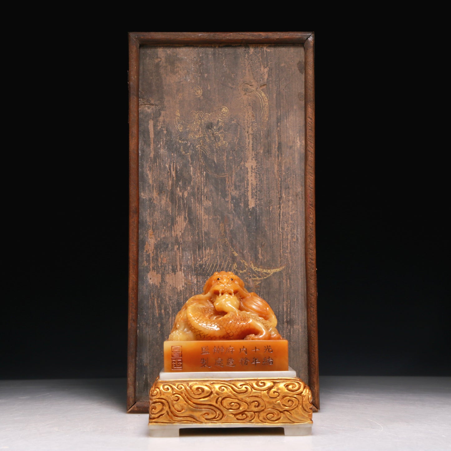 A Precious Tianhuang Stone 'Dragon' Seal With A Soapstone Gilded Stand