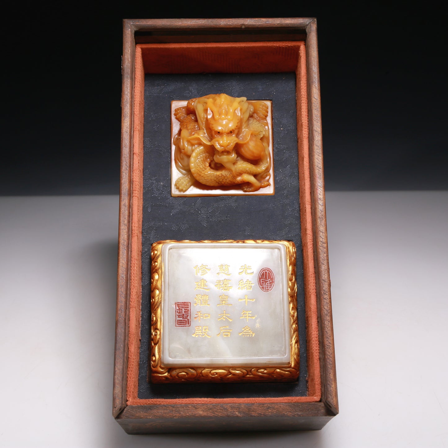 A Precious Tianhuang Stone 'Dragon' Seal With A Soapstone Gilded Stand