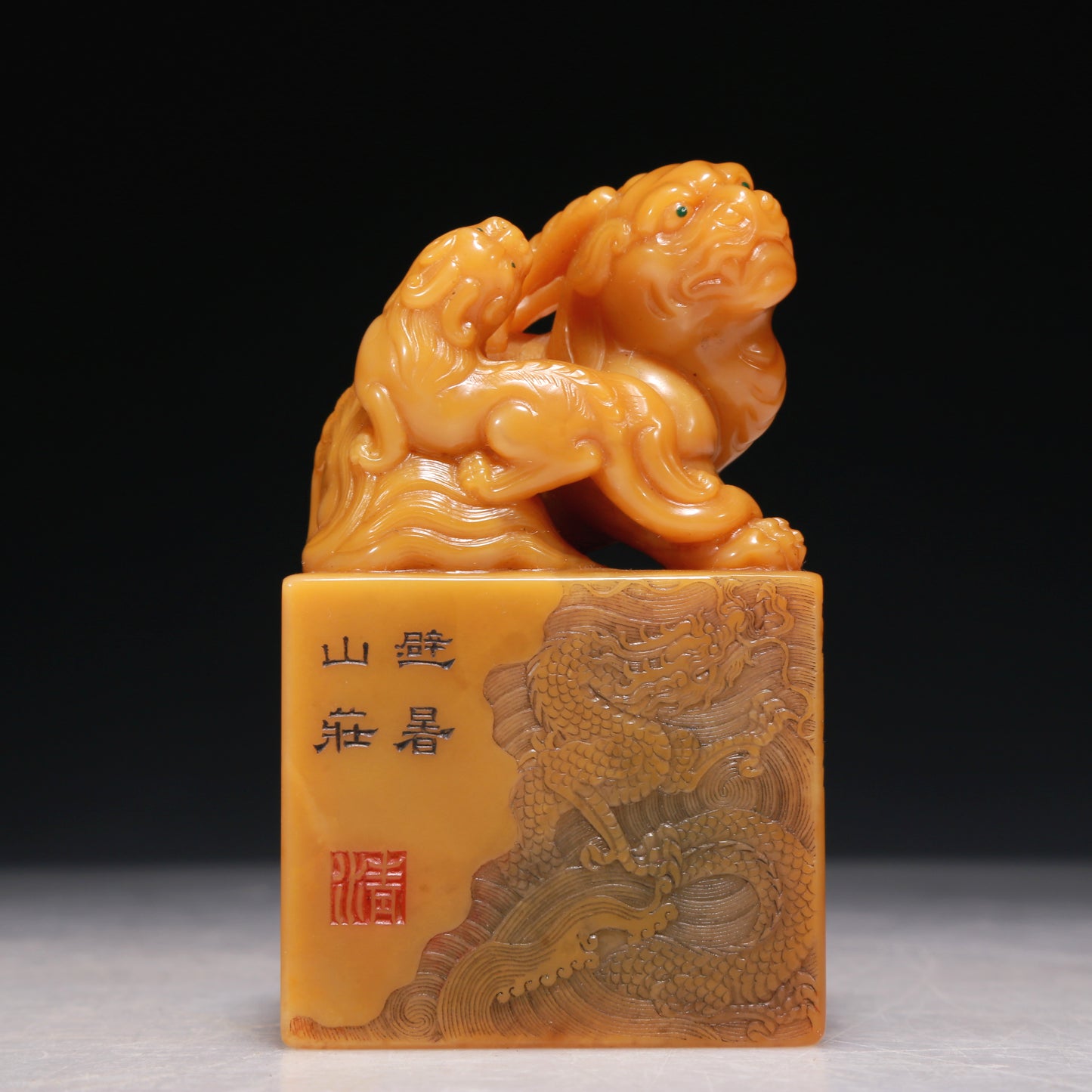 A Precious Tianhuang Stone 'Kylin' Seal With A Soapstone Stand