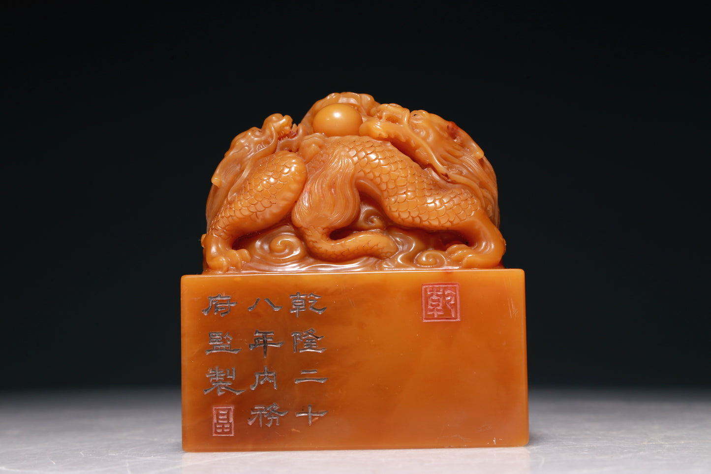 An Exquisite Tianhuang Stone 'Dragon' Seal With A Soapstone Gilded 'Ocean' Stand And A Wooden Gilded Polychrome 'Dragon' Box