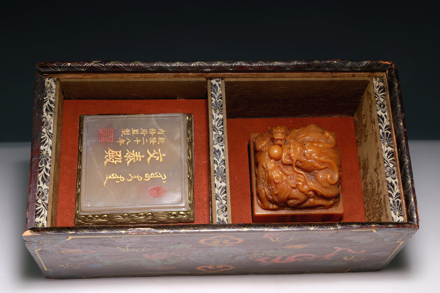 An Exquisite Tianhuang Stone 'Dragon' Seal With A Soapstone Gilded 'Ocean' Stand And A Wooden Gilded Polychrome 'Dragon' Box