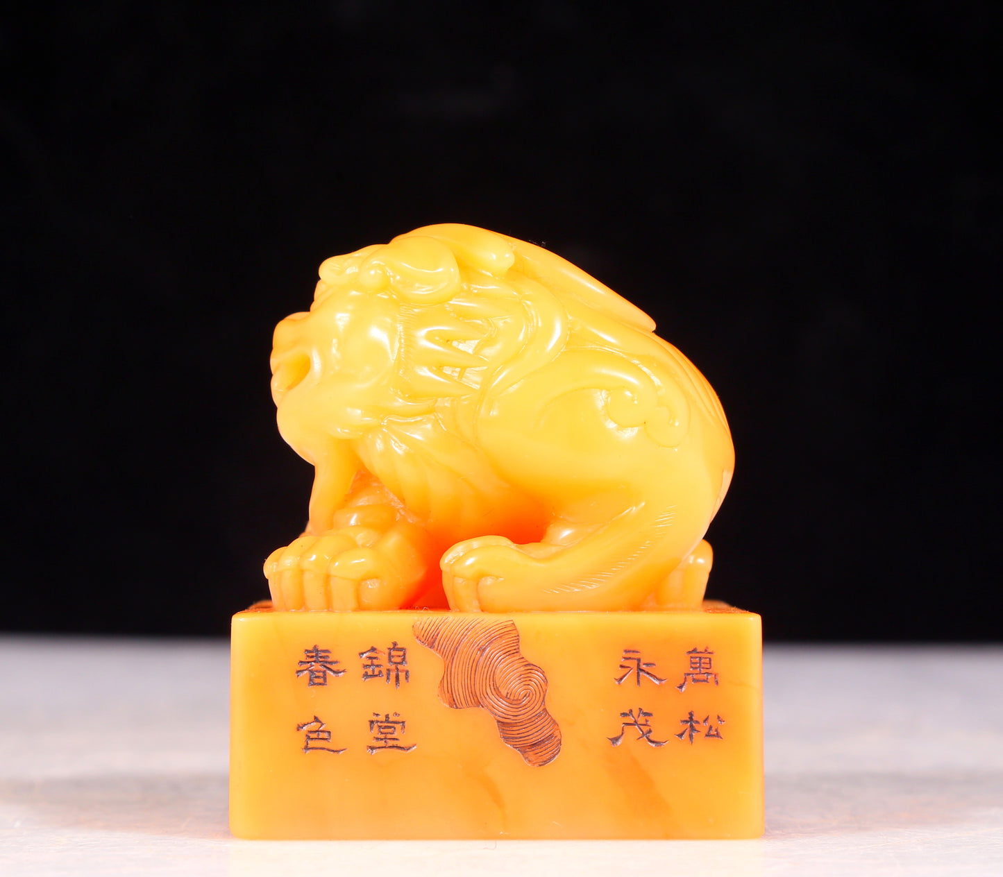 An exquisite field yellow stone unicorn seal