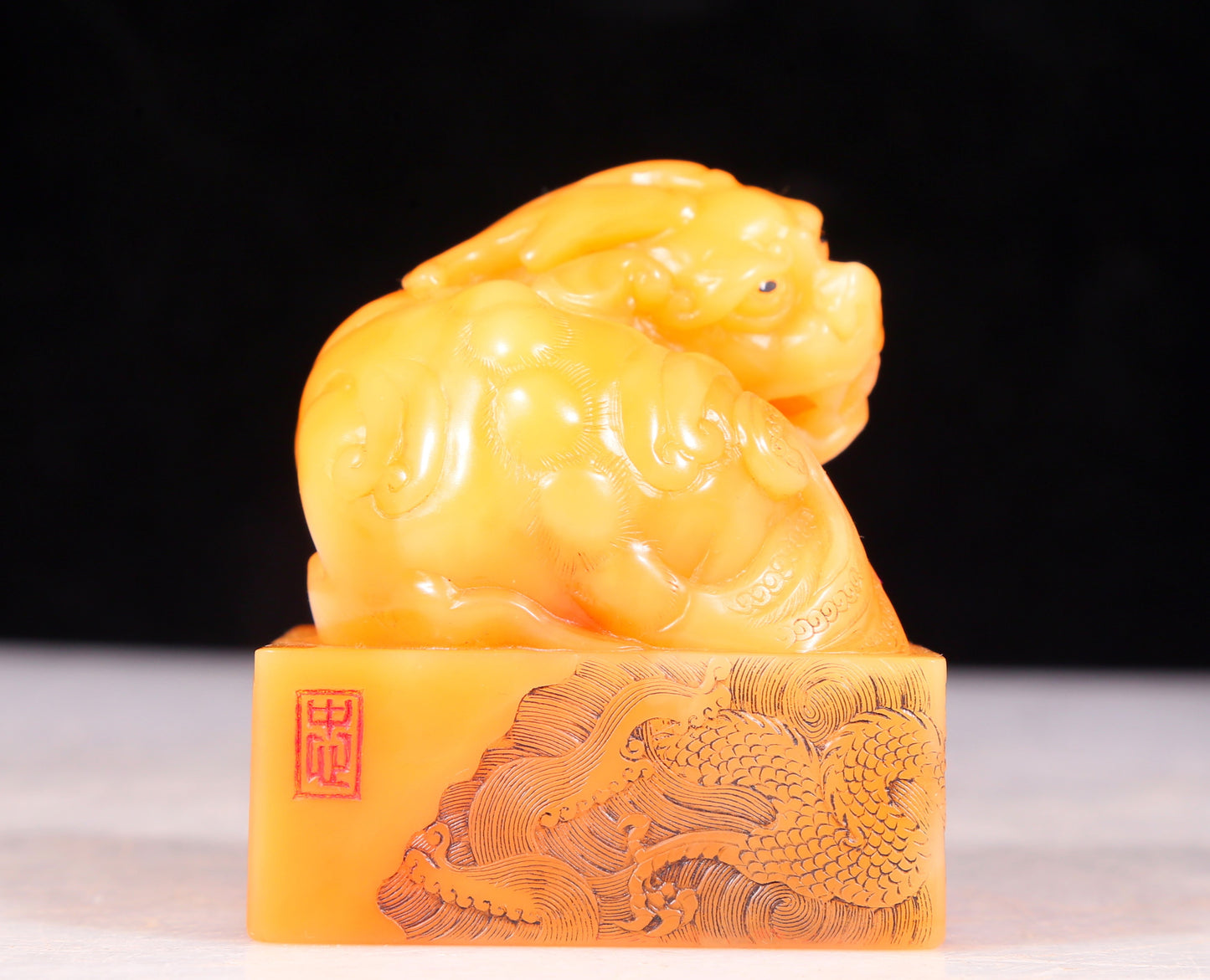 An exquisite field yellow stone unicorn seal