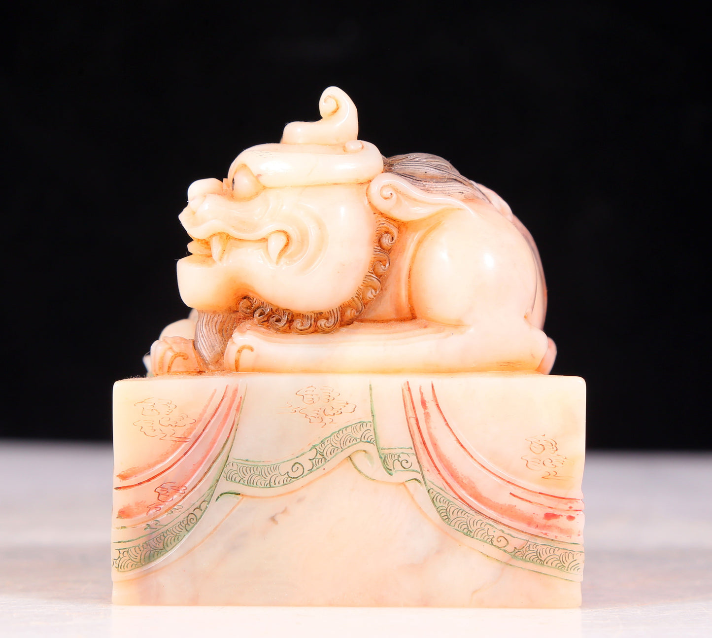 An exquisite Shoushan stone painted Arhat seal