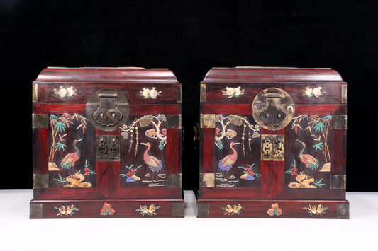 A perfect pair of huanghuali wood cabinets with inlaid gems and flower and bird patterns