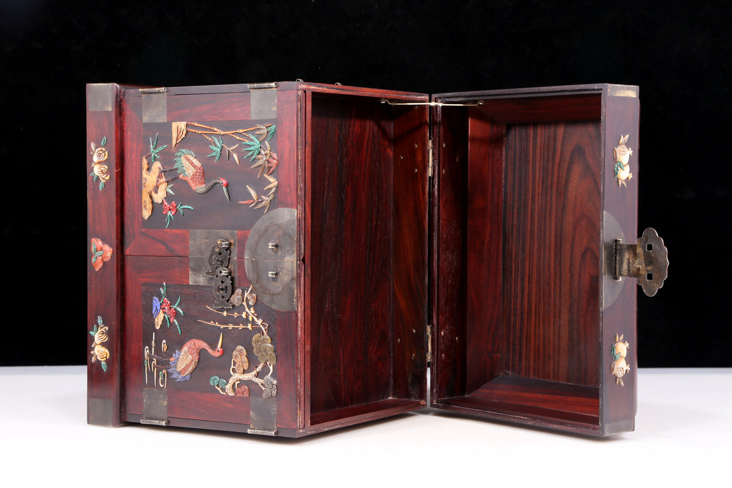 A perfect pair of huanghuali wood cabinets with inlaid gems and flower and bird patterns